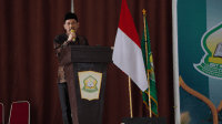Pj. Wali Kota Palopo, Drs. H. Firmanza DP., S.H., M.Si didampingi Pj.Ketua Pj. Ketua TP PKK Kota Palopo, Ny. Hj. Isnada Firmanza Menghadiri Kegiatan Penamatan Dan Wisuda Qur'an Angkatan IX